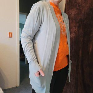soft green cardigan by Joan Voss